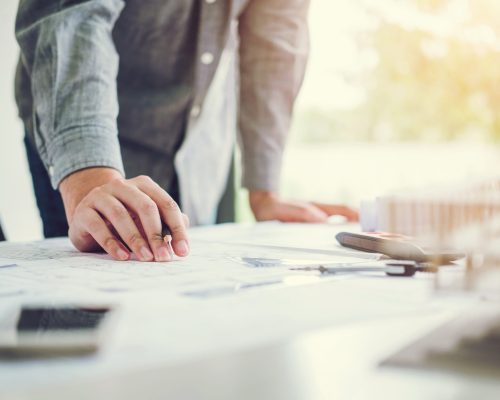 Architect,Or,Engineer,Working,In,Office,On,Blueprint.,Architects,Workplace